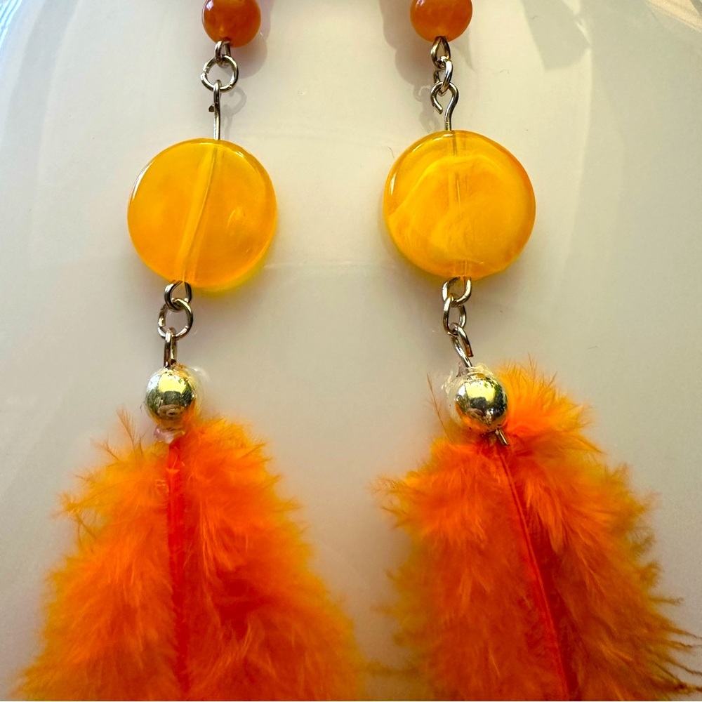 Orange feather earrings